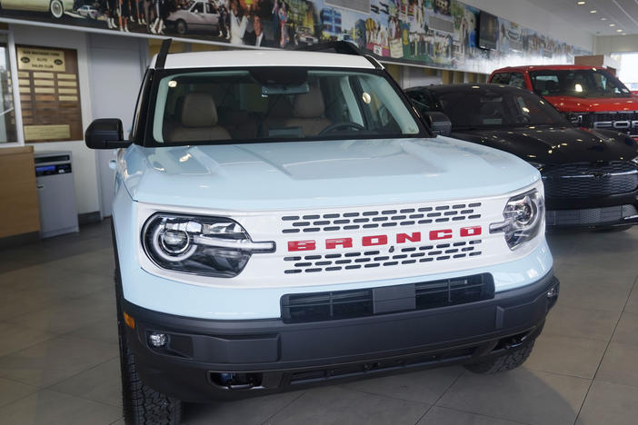 A Ford Bronco is displayed at a Ford dealership in Hialeah, Fla., on Jan. 23, 2023. Ford is recalling more than 456,000 Bronco Sport and Maverick vehicles due to a battery detection issue that can result in loss of drive power.