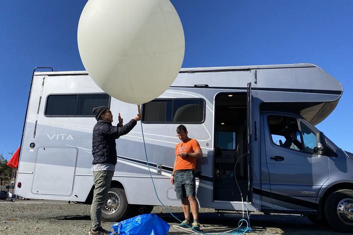 Andrew Song and Luke Iseman of Make Sunsets ready for a launch. Iseman says they hope to someday cool the earth on a larger scale.