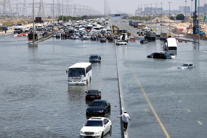 Atypically heavy rains in the United Arab Emirates on Monday and Tuesday caused flooding, flight cancellations and school closures. Vehicles were abandoned on highways like this one in Dubai.