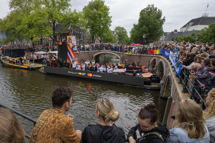 Tens of thousands of people watched as dozens of colorfully decorated boats toured the Dutch capital's historic canals Saturday, Aug. 5, 2023, in the most popular event of a six-day Pride Amsterdam festival that attracts tens of thousands of visitors to the city.