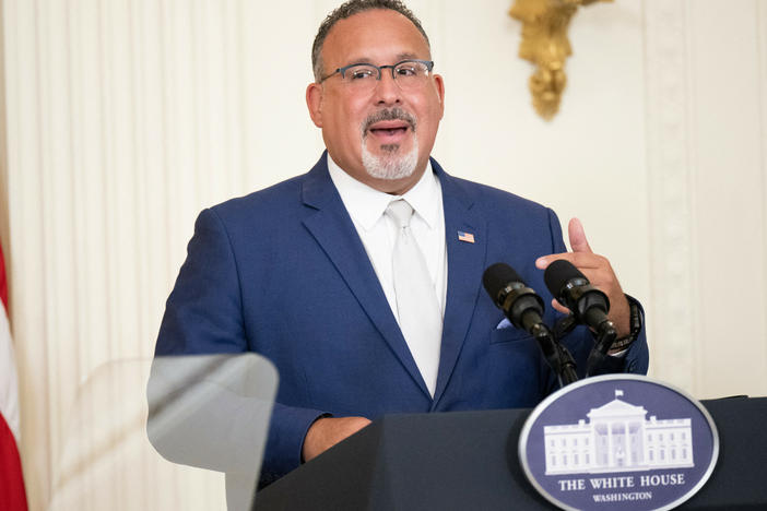 "Our nation's educational institutions should be places where we not only accept differences, but celebrate them," U.S. Education Secretary Miguel Cardona, seen in the East Room of the White House in August 2023, said of the new Title IX regulation.