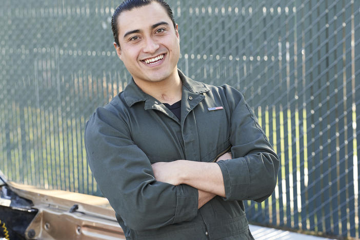 Diego Aguilar works at a trade center at East Bay Municipal Utility District in Oakland, Calif.