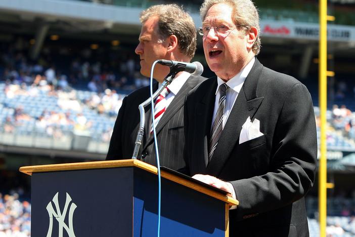 New York Yankees radio broadcaster John Sterling speaks during the teams 63rd Old Timers Day before the game against the Detroit Tigers on July 19, 2009, at Yankee Stadium in the Bronx borough of New York City.