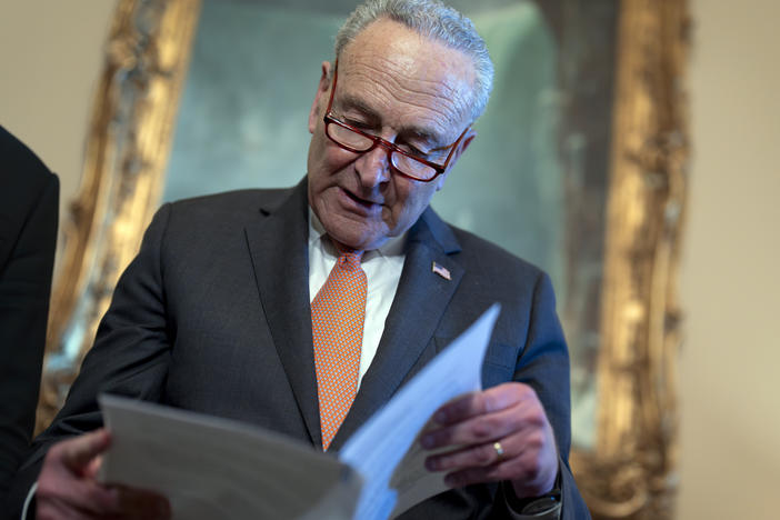 Senate Majority Leader Chuck Schumer, D-N.Y., looks over his notes during a meeting with Ukraine's Prime Minister Denys Shmyhal as Congress moves to advance an emergency foreign aid package for Israel, Ukraine and Taiwan, at the Capitol in Washington, Thursday, April 18, 2024.