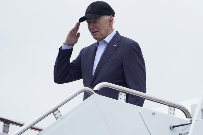 President Biden salutes as he boards Air Force One as he leaves Andrews Air Force Base, Md., on his way to his Delaware home on Friday.