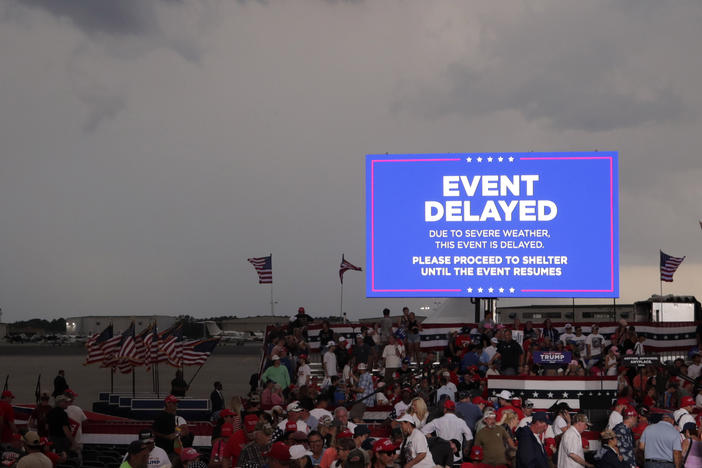 Supporters of former President Donald Trump file out of the rally after it was canceled due to threatening weather in Wilmington, N.C., Saturday, April 20, 2024.