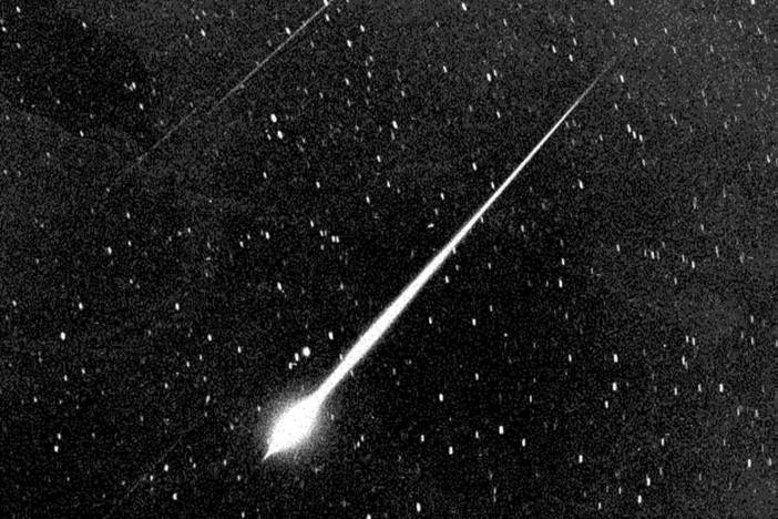 A Leonid fireball is shown during the storm of 1966 in the sky above Wrightwood, Calif.
