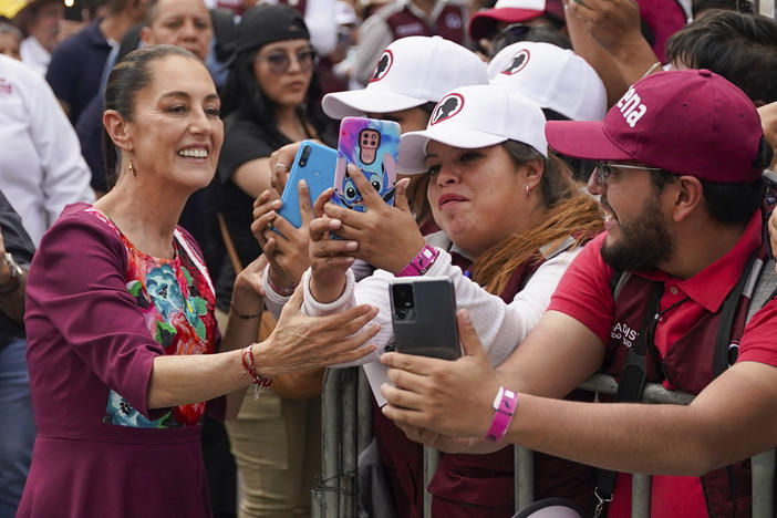 Mexican presidential candidate Claudia Sheinbaum greets supporters upon her arrival to her opening campaign rally at the Zócalo plaza in Mexico City, on March 1.