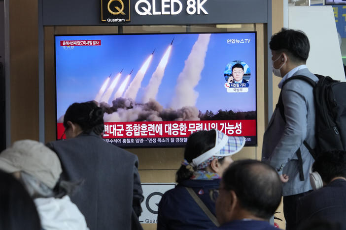 A TV screen shows a file image of North Korea's missiles launch during a news program at the Seoul Railway Station in Seoul, South Korea, Monday, April 22, 2024.