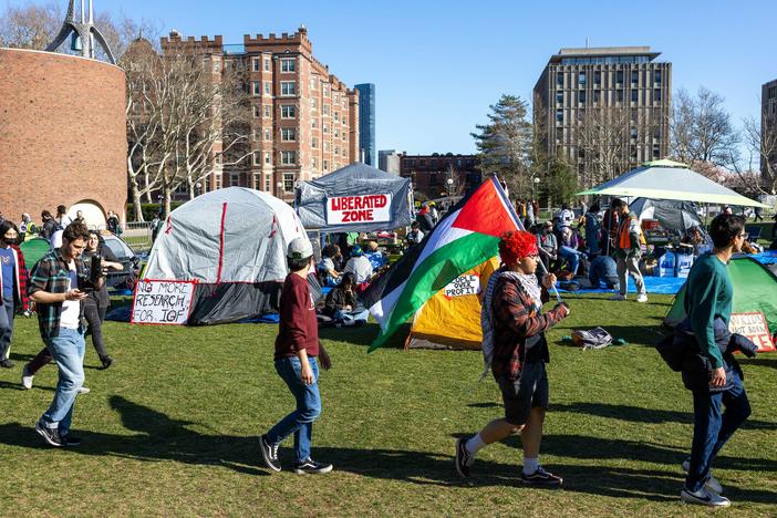 Students from MIT, Harvard University and others rally at a protest encampment at MIT's Kresge Lawn in Cambridge, Massachusetts on Monday.