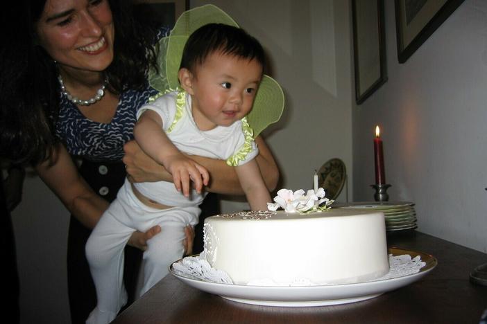 Scott Simon's daughter Elise and his wife, Caroline, on Elise's first birthday.