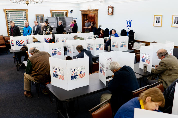 Voters take to the polls in the early hours of the morning on Tuesday, Nov. 8, 2022, during the 2022 Midterm Elections at Ladue City Hall in Ladue, Mo.
