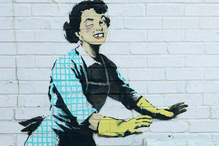 <em>Valentine's Mascara</em> by street artist Banksy, on the side of a house in Margate, England.