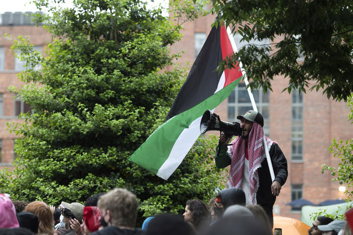 Students protest the Israel-Hamas war at George Washington University in Washington, D.C., on Saturday. Protests and encampments have sprung up on college and university campuses across the country to protest the war.