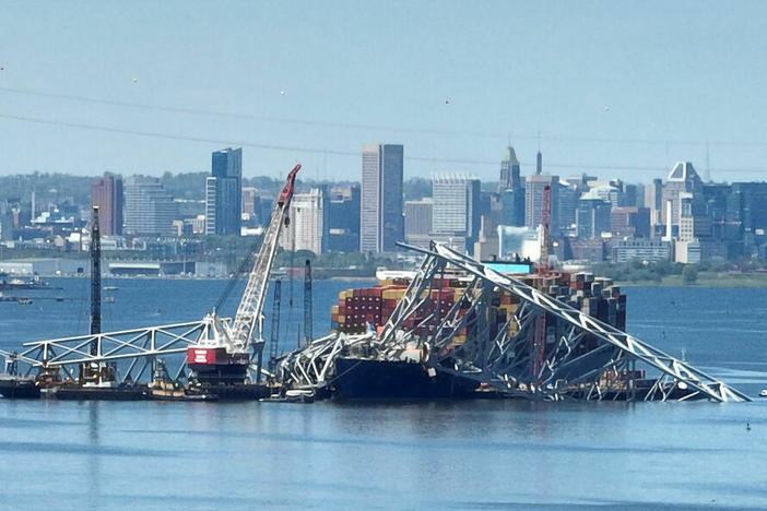 Salvage crews in Baltimore continue to remove wreckage from the Dali on April 26, one month after the cargo ship smashed into the Francis Scott Key Bridge and caused it to collapse.