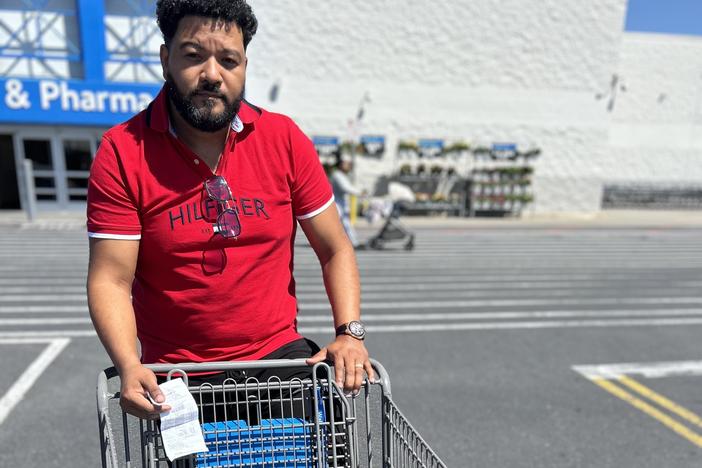 Luis Escarraman spent $139 when he picked up some vitamin C and a few items of clothing for himself and his daughter. "I need to work extra to get what I used to have before," he told NPR.
