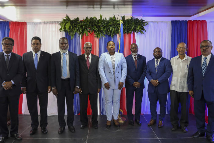 Transitional Council members, from left to right; Fritz Alphonse Jean, Laurent Saint-Cyr, Frinel Joseph, Edgard Leblanc Fils, Regine Abraham, Emmanuel Vertilaire, Smith Augustin, Leslie Voltaire and Louis Gerald Gilles, pose for a group photo after a ceremony to name its president and a prime minister in Port-au-Prince, Haiti, Tuesday, April 30, 2024.