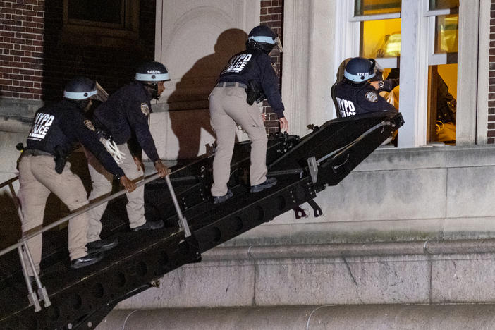 Using a tactical vehicle, New York City police enter an upper floor of Hamilton Hall on the Columbia University campus in New York on Tuesday, after protesters took over the building earlier in the day.