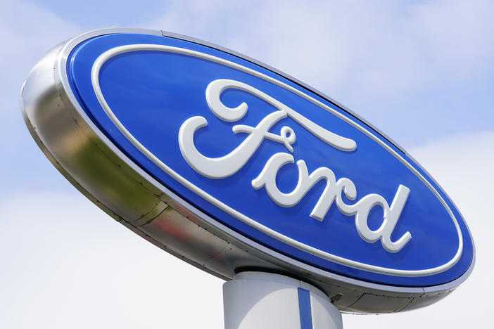 A Ford sign is shown at a dealership in Springfield, Pa., in 2022. Ford is recalling nearly 243,000 Maverick small pickup trucks in the U.S. because the tail lights may not illuminate.