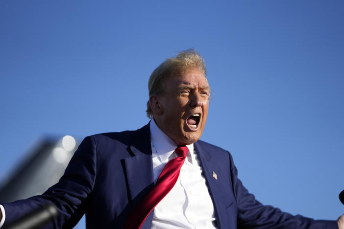 Republican presidential candidate and former President Donald Trump speaks at a campaign rally in Freeland, Mich., on Wednesday. A pair of rallies in the pivotal states of Wisconsin and Michigan are his first campaign trail appearances since his trial in New York over alleged campaign finance violations started.