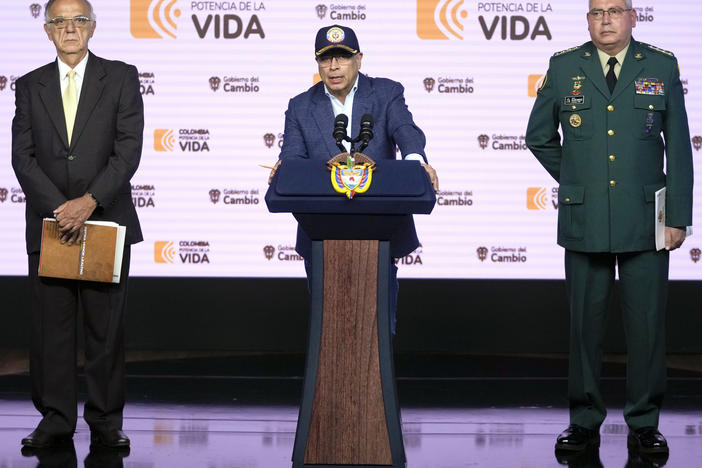 Colombia's President Gustavo Petro speaks during a press conference flanked by Colombia's Defense Minister Ivan Velasquez, left, and Colombia's Armed Forces Commander, Gen. Helder Giraldo, at the Narino Presidential Palace in Bogota, Colombia, on Tuesday.