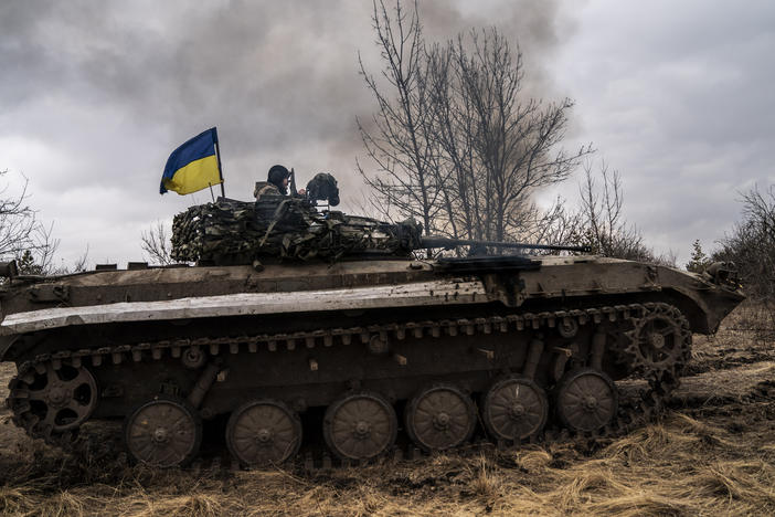 Ukrainian tank-men are seen on a BWP infantry fighting vehicle prepare for combat as the war between Russia and Ukraine continues in the direction of Lyman in Donetsk Oblast, Ukraine on March 17, 2024.