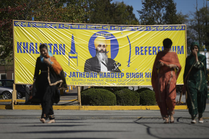 A banner that shows the late Sikh separatist leader Hardeep Singh Nijjar is displayed outside the Guru Nanak Sikh Gurdwara Sahib in Surrey, British Columbia, on Sept. 18, 2023.