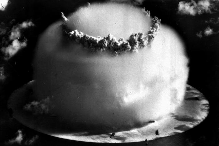 So-called atomic veterans who worked on nuclear weapons tests, like this one from July 25, 1946 file photo above Bikini atoll in the Marshall Islands, are fighting to renew funds that compensate them for health effects from their work.