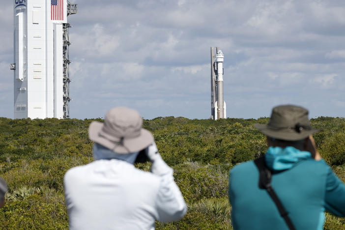 Photographers capture the Boeing Starliner capsule atop an Atlas V rocket as it is rolled out to the launch pad at Space Launch Complex 41, Saturday, May 4, 2024, in Cape Canaveral, Fla.