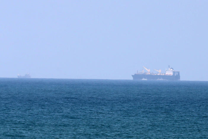 A U.S. Navy ship docks off the coast of the Gaza Valley area in the central Gaza Strip on April 29, 2024. The ship is expected to participate in the construction work of a floating naval dock to deliver more humanitarian aid to Gaza Strip  announced in March.