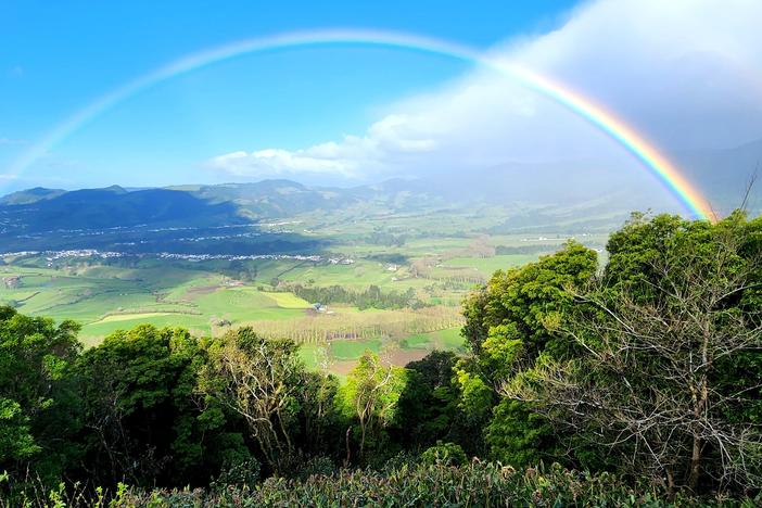 Rain often sweeps the Azores, shaping lush forests and emerald green meadows. When the skies clear, views are often spectacular.