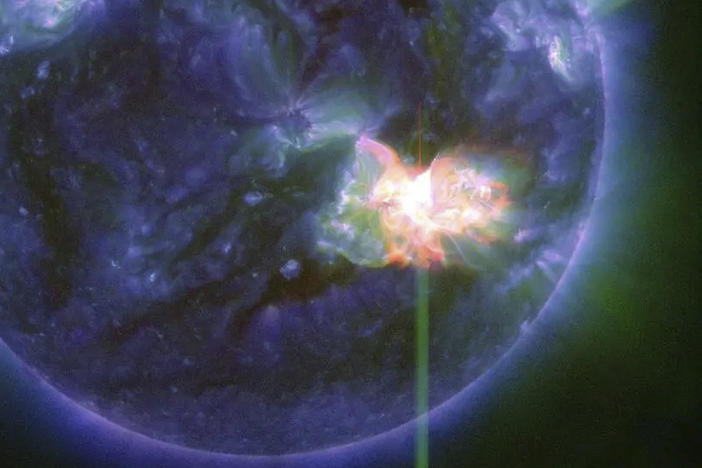 The solar flare as captured by NASA's Solar Dynamics Observatory on Thursday. The flare has triggered a severe geomagnetic storm watch for the first time in nearly 20 years.