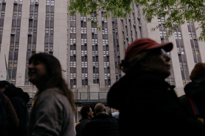 A line forms Monday outside the courthouse for a chance to sit in on the 16th day of former President Trump's hush-money trial in Manhattan, N.Y.