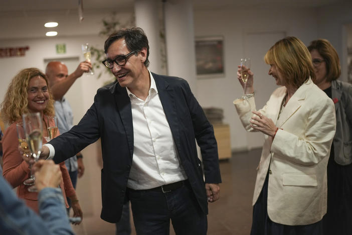 Socialist candidate Salvador Illa makes a toast with members of his team and party colleagues after the announcement of the results of elections to the Catalan parliament in Barcelona on Sunday.