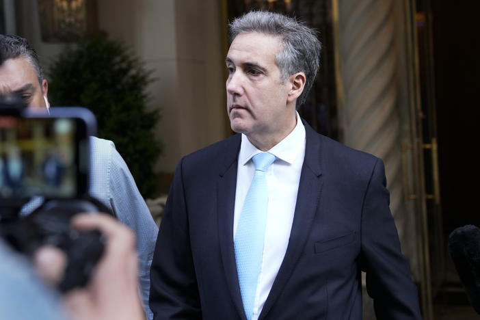 Michael Cohen, former President Donald Trump's ex-fixer, leaves his apartment building in New York Tuesday morning.