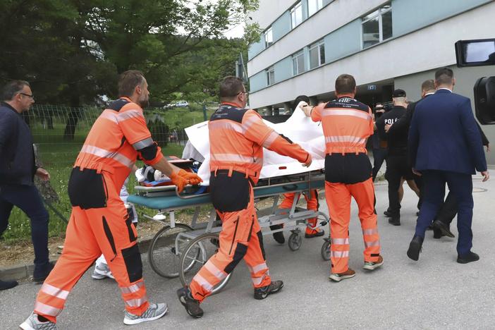 Rescue workers take Slovak Prime Minister Robert Fico, who was shot and injured, to a hospital in the town of Banska Bystrica, in central Slovakia, on Wednesday.