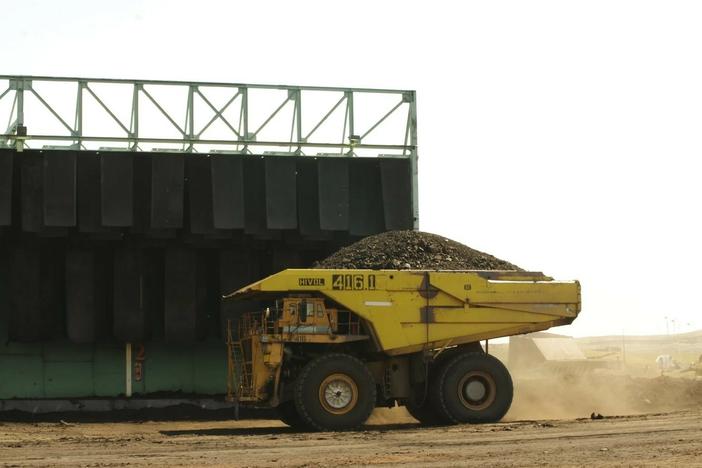 A giant truck hauls coal at a mine in the Powder River Basin in Wyoming