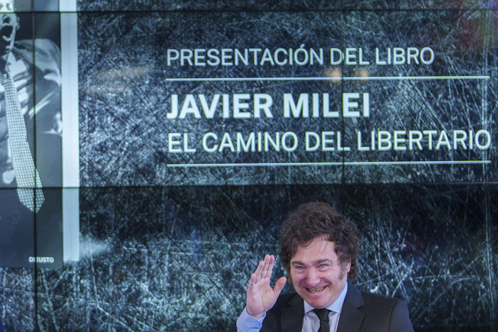 Argentina's President Javier Milei gestures as he presents his book "El camino del libertario" in Madrid, Spain, on Friday.
