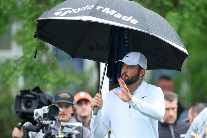 Scottie Scheffler reacts before teeing off Friday on during the second round of the 2024 PGA Championship at Valhalla Golf Club in Louisville, Ky. Scheffler was arrested and charged after an interaction early Friday morning with a police officer directing traffic into to the club.