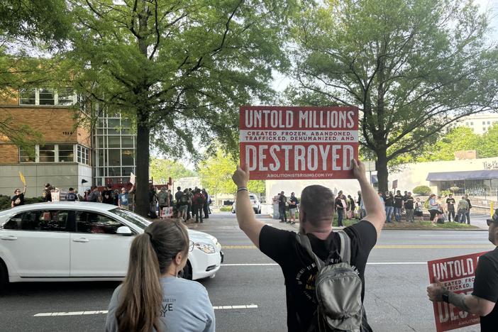 Anti-abortion activists who describe themselves as "abolitionists" protest outside a fertility clinic in North Carolina in April 2024.
