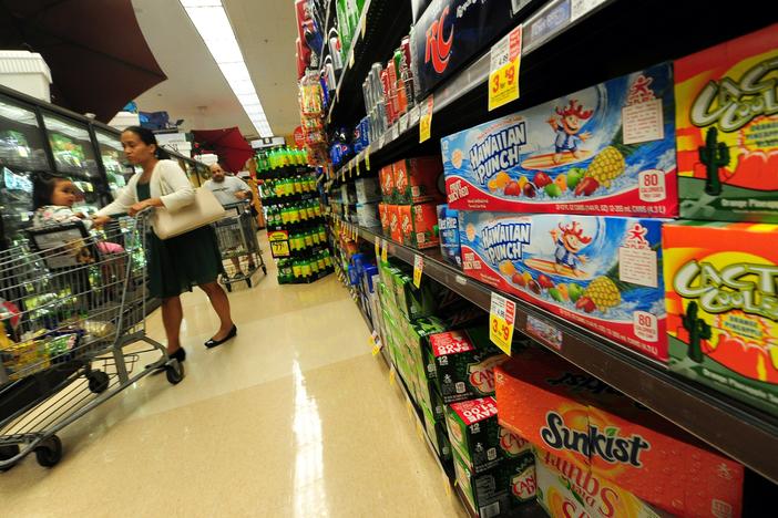 Rising prices remain a top concern for Americans, according to a new survey by the Federal Reserve. But 72% of adults say they're living comfortably financially or at least doing OK.