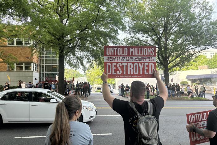 Anti-abortion activists who describe themselves as "abolitionists" protest outside a fertility clinic in North Carolina in April 2024.