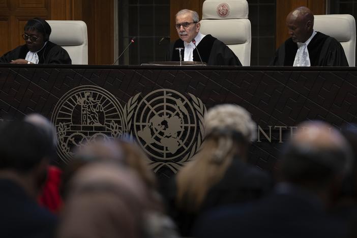 Presiding Judge Nawaf Salam reads the ruling of the International Court of Justice in The Hague, Netherlands, on Friday, May 24. The top United Nations court ruled on an urgent plea by South Africa for judges to order Israel to halt its military operations in Gaza and withdraw from the enclave.