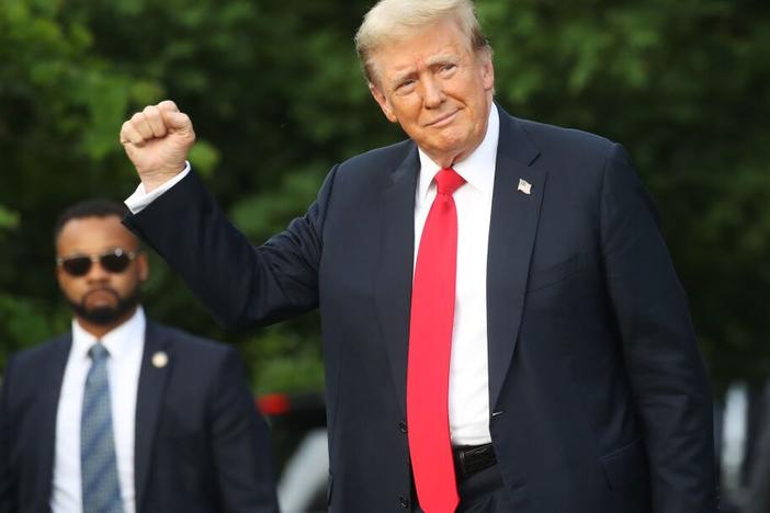Former President Donald Trump arrives at a rally in the historical Democratic district of the South Bronx on May 23, 2024 in New York City, just days before a Manhattan jury is set to begin deliberations on whether to convict Trump of felony charges in his criminal hush money trial.
