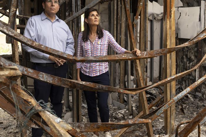 American politician Nikki Haley (R) and Parliament member Danny Danon (L) visit a kibbutz Monday that was damaged during the Oct. 7 Hamas attack in Nir Oz, Israel. 