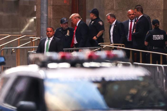 Former President Donald Trump leaves Manhattan Criminal Court in New York City at the end of the day's proceedings Tuesday during his criminal trial for allegedly covering up hush money payments. 