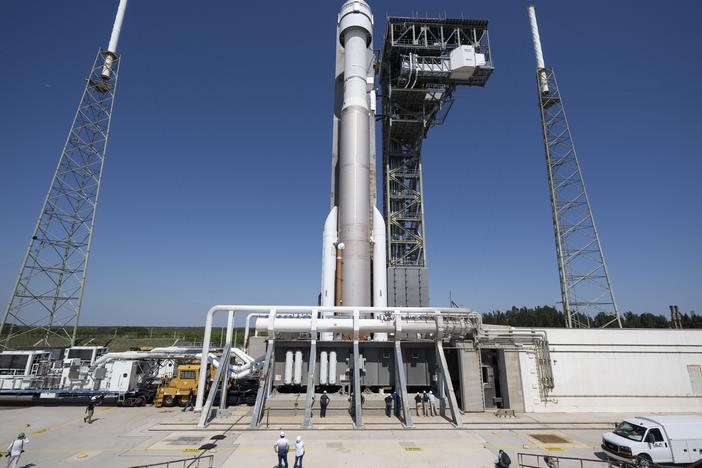 A United Launch Alliance Atlas V rocket with Boeing's Starliner spacecraft aboard is rolled to the launch pad on Thursday ahead of the NASA's Boeing Crew Flight Test.