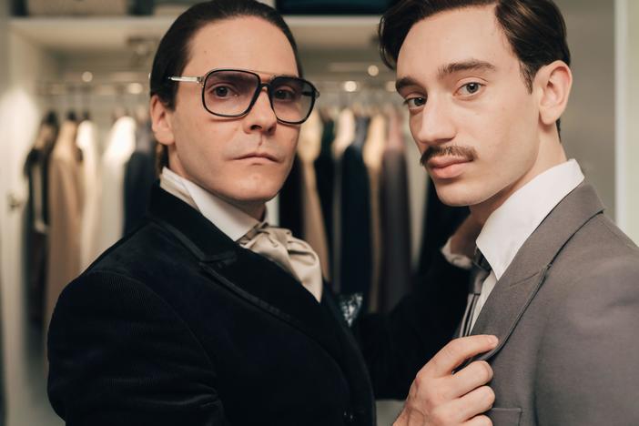 Fashion designer Karl Lagerfeld (Daniel Brühl), left, meets and falls in love with Jacques de Bascher (Théodore Pellerin) in <em>Becoming Karl Lagerfeld</em>.