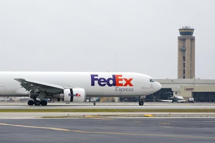 A FedEx Boeing 767 cargo plane similar to this one, seen here in Fort Lauderdale, Fla., almost collided with a Southwest jet at the international airport in Austin, Texas, last year. Safety investigators say an air traffic controller's mistake was to blame and that critical safety technology might have prevented the incident.