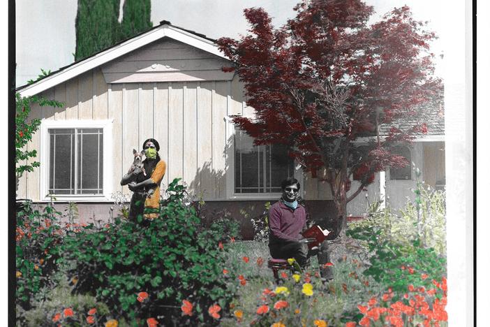 Nitya Kansal (left) and her husband, Arvind Kansal (right), pose in front of their home in Cupertino, Calif.